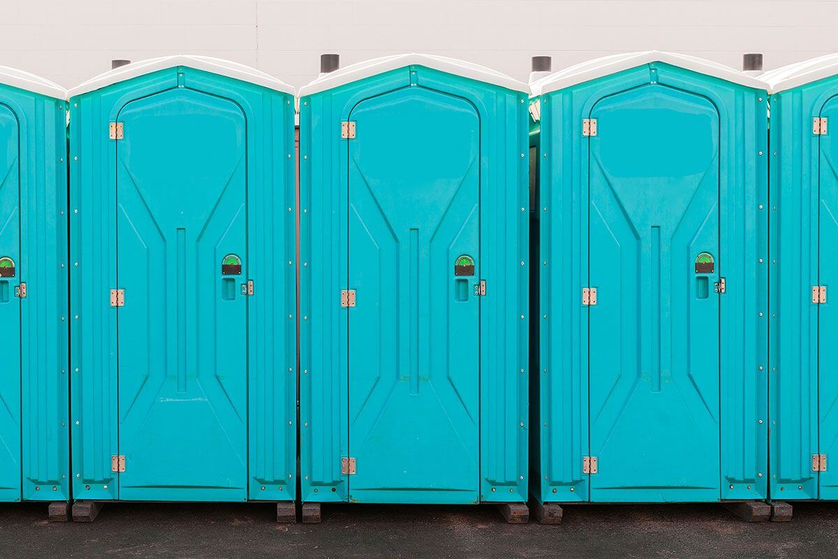 Industrial portable restroom units at a plant in West Covina, California